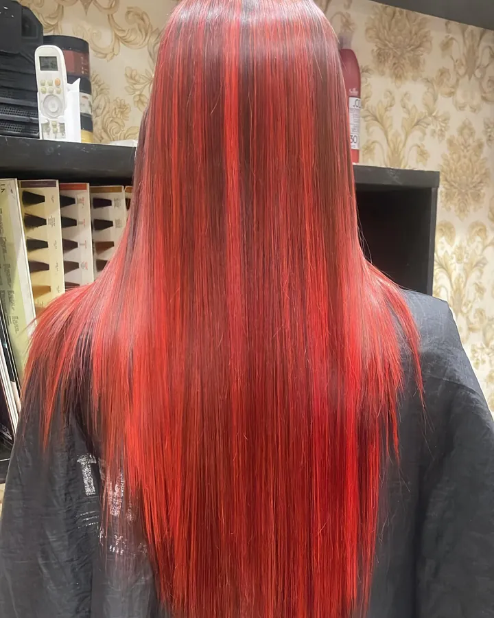 Long red hair colour done at Khadija's